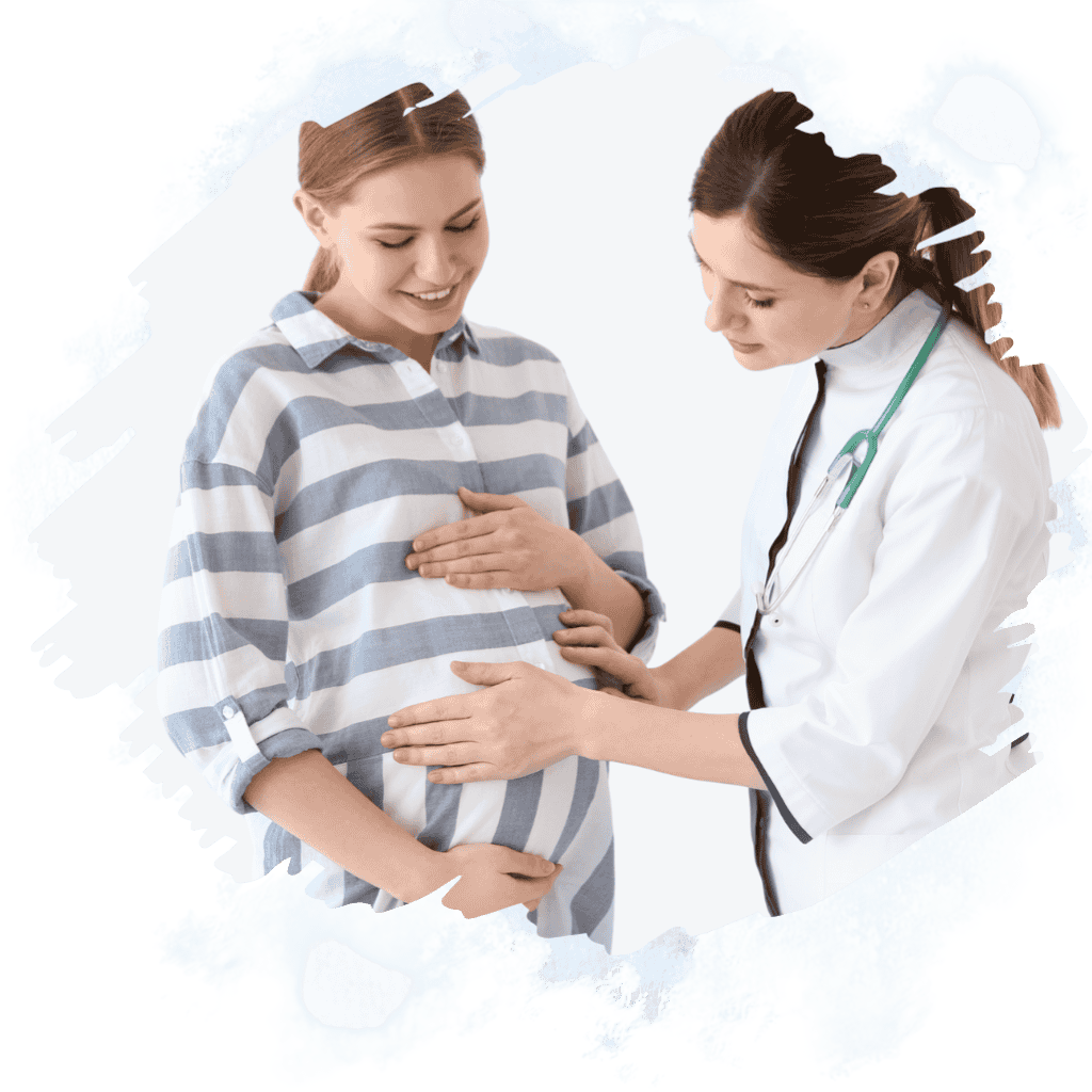 Pregnant woman consulting female gynecologist in Sharjah at Shifa Al Jazeera Medical Centre
