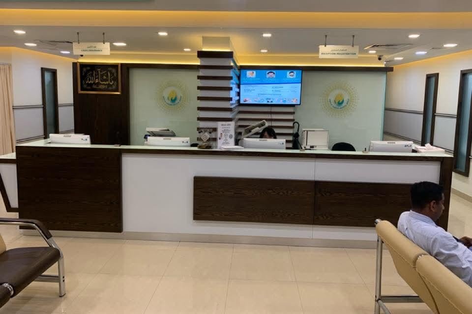 Reception area at Shifa Al Jazeera Medical Centre in Rolla, Sharjah — modern, clean, and patient-friendly front desk