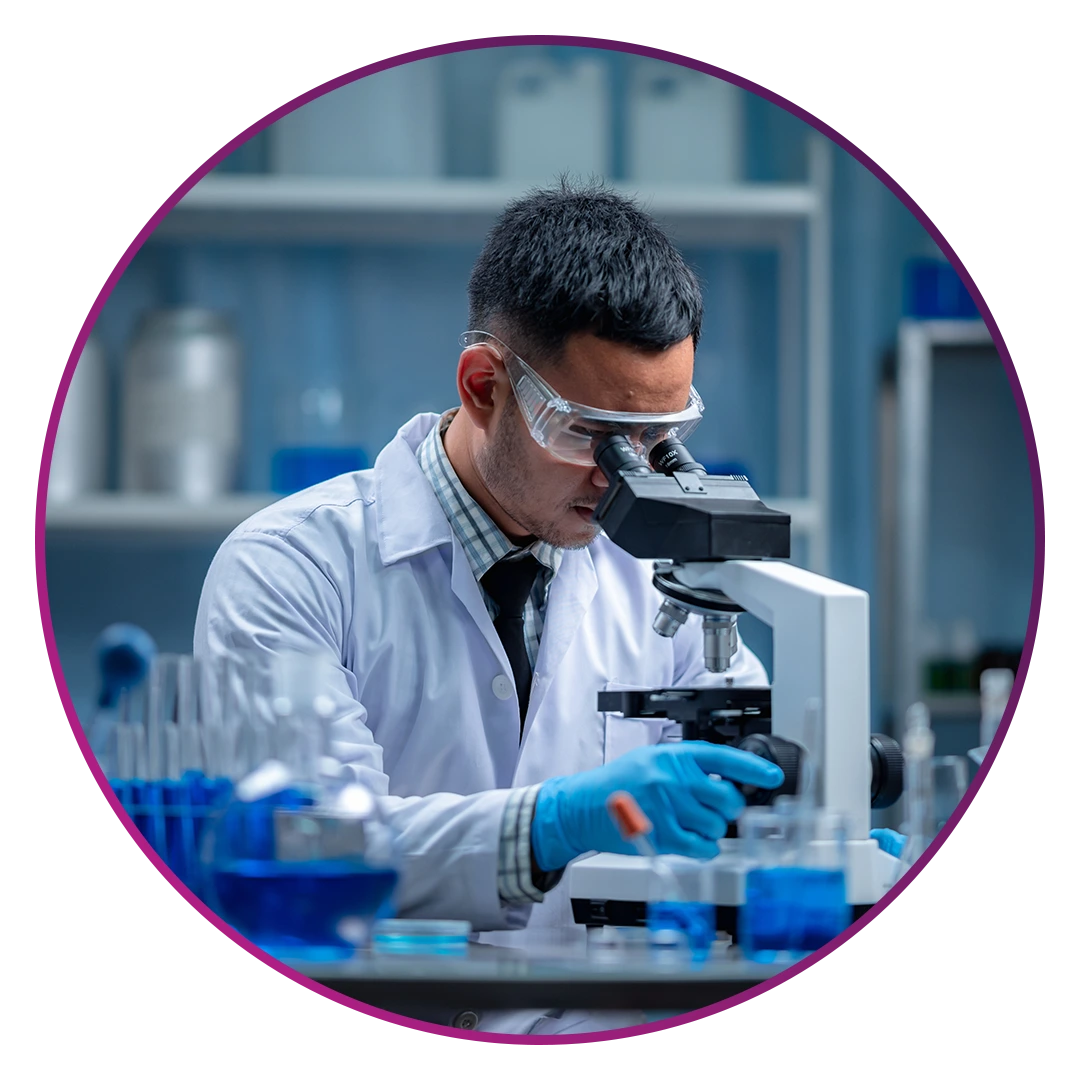 Pathology lab technician conducting blood test analysis at Shifa Al Jazeera Medical Centre Muwaileh Sharjah